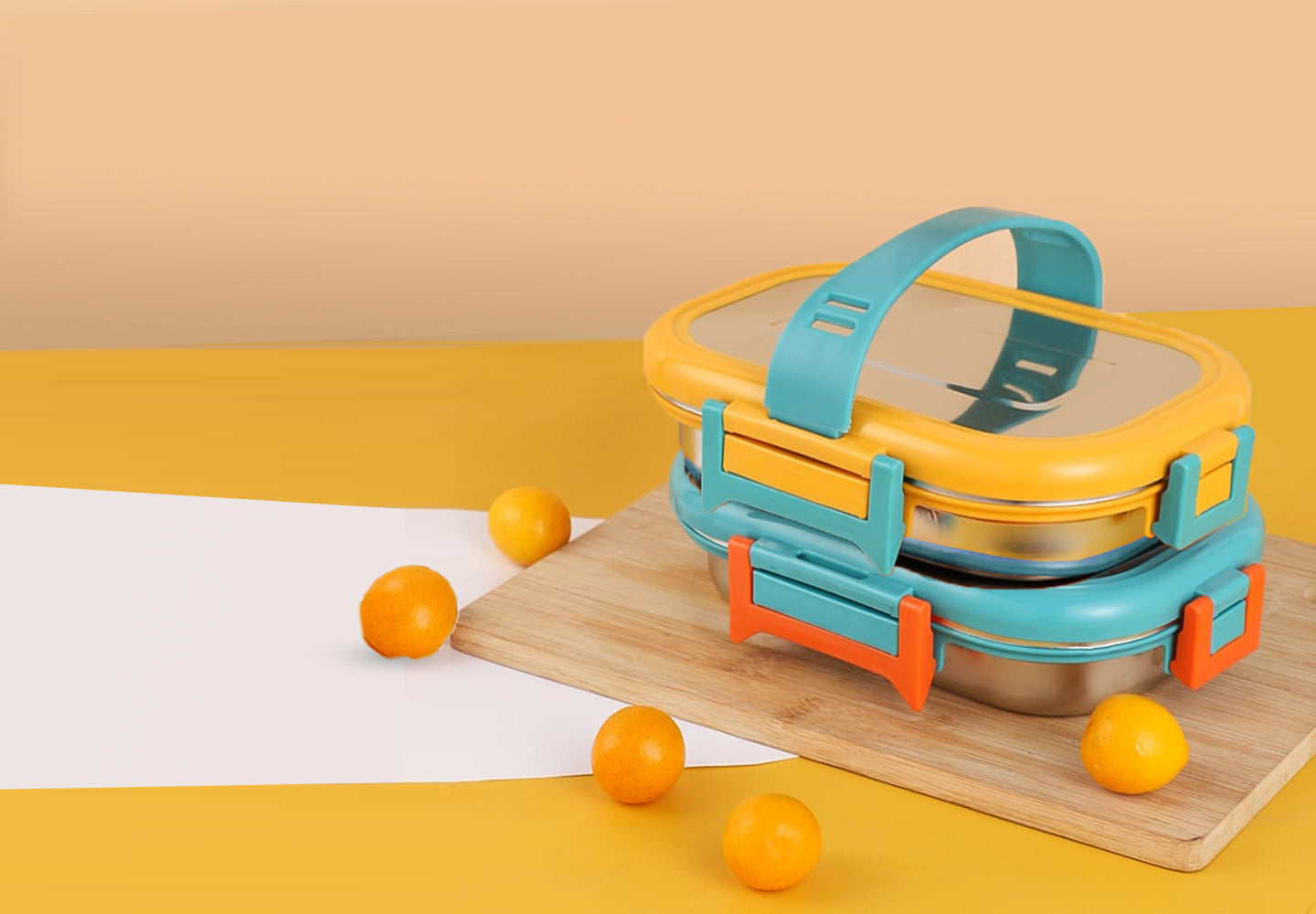 Recto Lunchbox in bright yellow, blue and orange colors - fully steel body and steel lids with a handle to carry easily